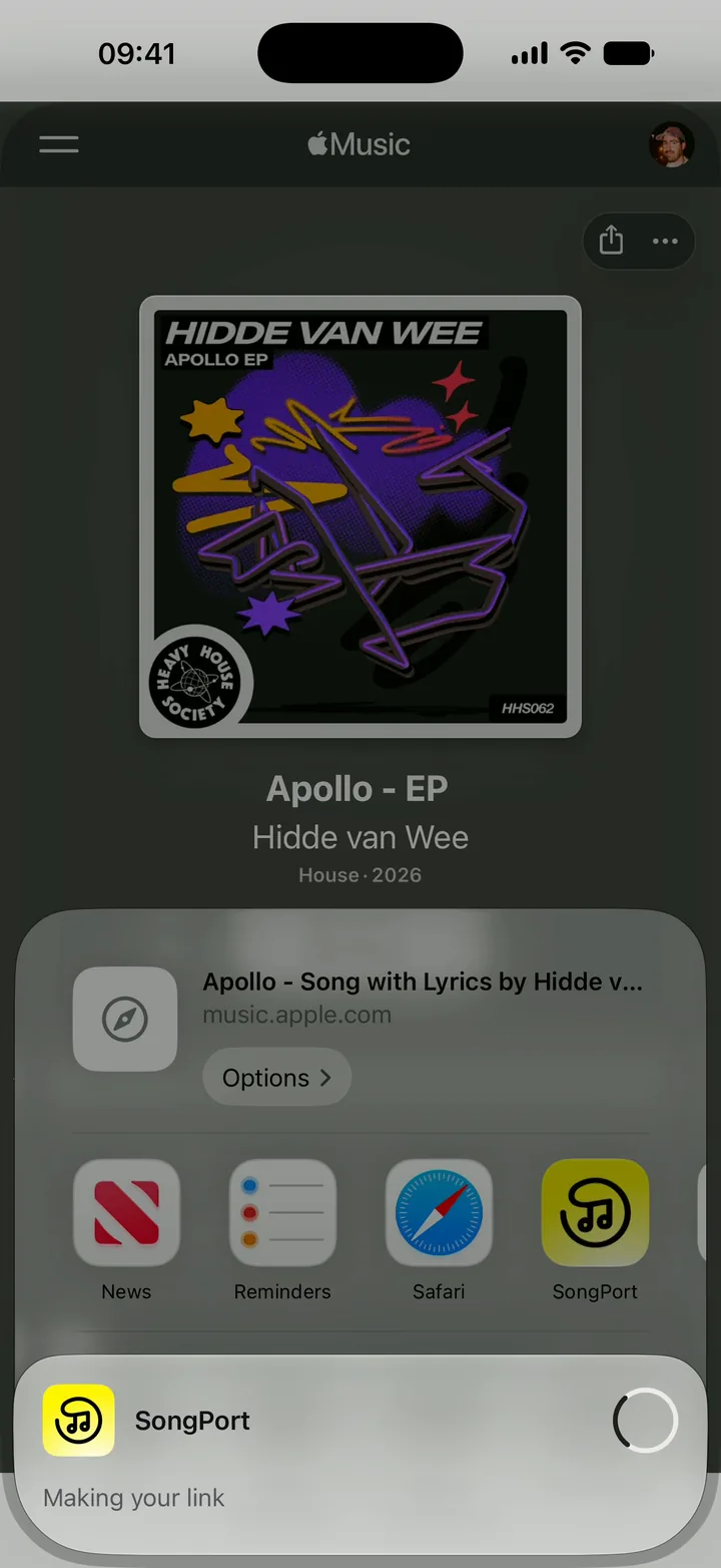 The share sheet over Apple Music, with a SongPort card that says Making your link.